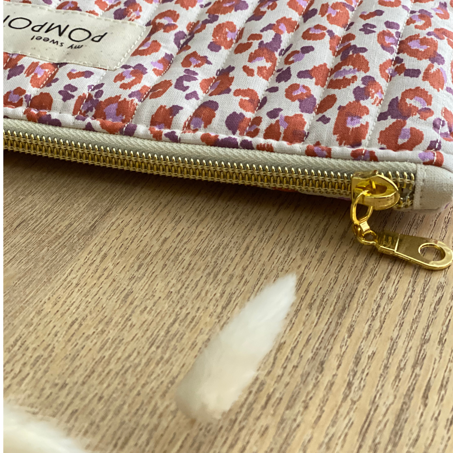 Pochette plate trousse à maquillage léopard brique et parme