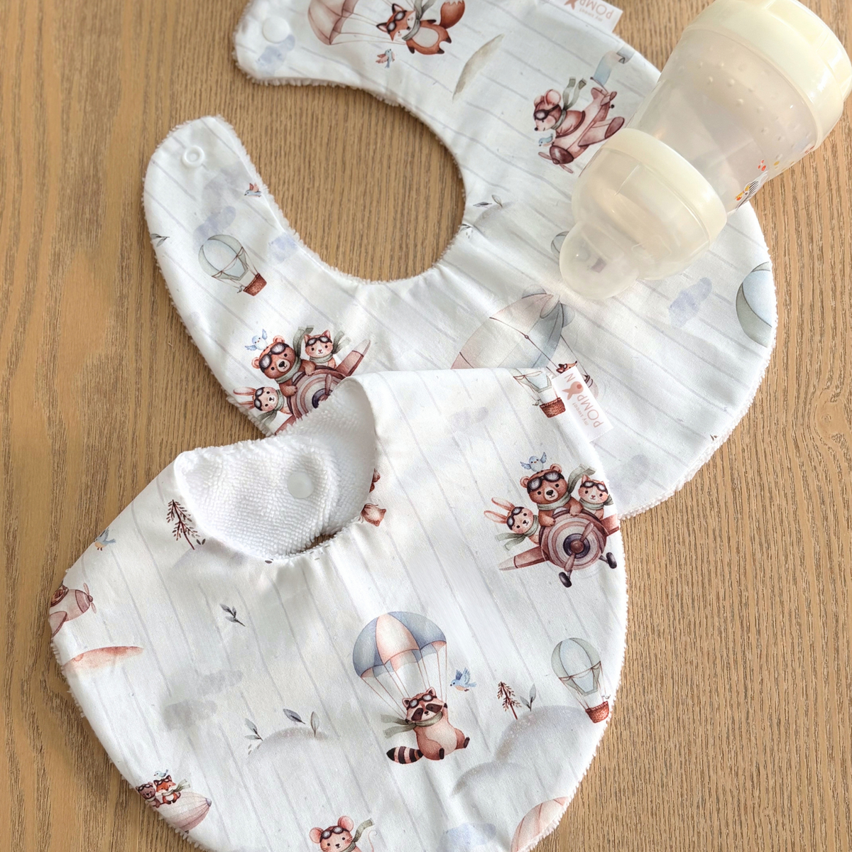 Bavoir naissance en coton blanc animaux aviateurs