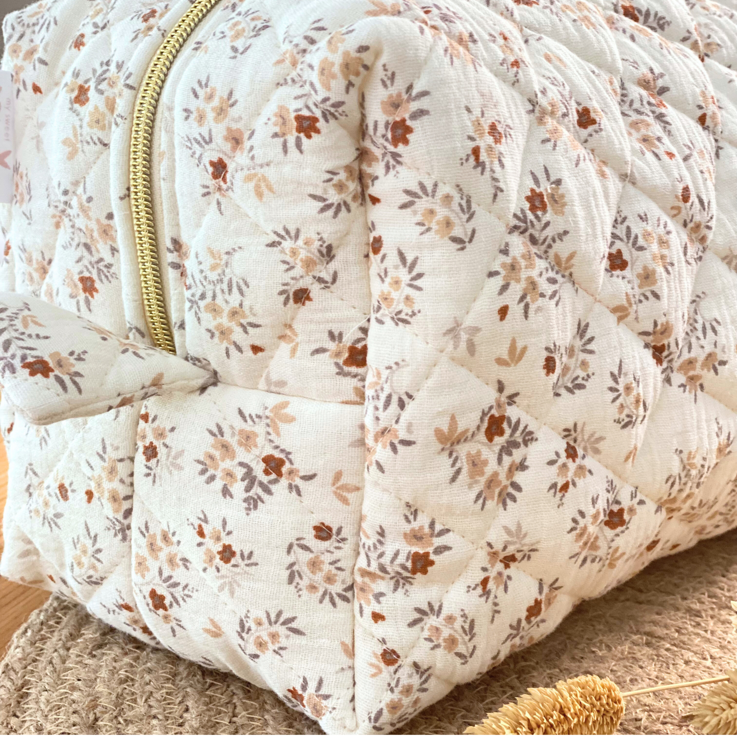 Trousse de toilette à fleurs beige et rouille pour sac à langer
