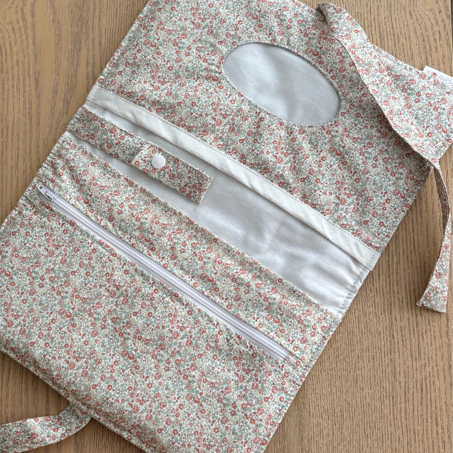 Pochette à langer nomade range couches millefleurs