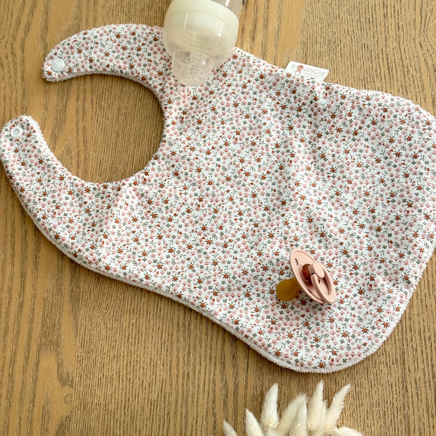 Bavoir bébé fleurs rose